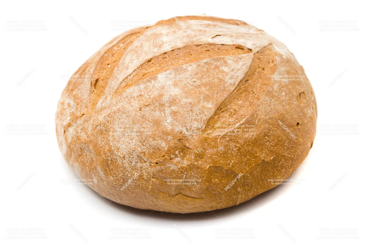 A close-up view of a rustic wooden table topped with a loaf of freshly baked bread, its golden crust inviting and aromatic. The scene conveys a warm, inviting atmosphere, suggesting the pleasures of homemade or artisanal baked goods, and the comfort of sharing food in a cozy setting.